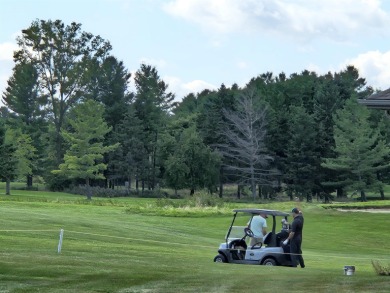 GOLF COURSE CONDO- Perfect for golf enthusiasts or anyone who on Lakeview Hills Country Club and Resort  in Michigan - for sale on GolfHomes.com, golf home, golf lot