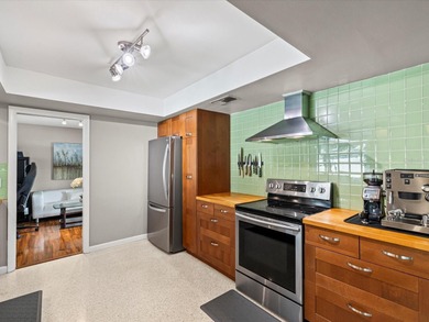 Tucked into one of Dunedin's most sought after on The Dunedin Country Club in Florida - for sale on GolfHomes.com, golf home, golf lot