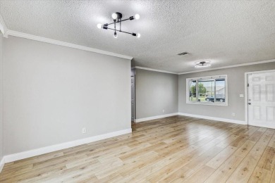 Step into homeownership with this beautifully renovated on Apollo Beach Golf and Sea Club in Florida - for sale on GolfHomes.com, golf home, golf lot