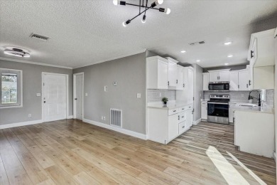 Step into homeownership with this beautifully renovated on Apollo Beach Golf and Sea Club in Florida - for sale on GolfHomes.com, golf home, golf lot