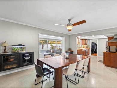 Tucked into one of Dunedin's most sought after on The Dunedin Country Club in Florida - for sale on GolfHomes.com, golf home, golf lot