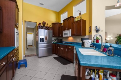 Check out this lavish 4- bedroom, 2.5-bath, 3-car garage home at on Twisted Oaks Golf Club in Florida - for sale on GolfHomes.com, golf home, golf lot