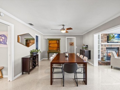 Tucked into one of Dunedin's most sought after on The Dunedin Country Club in Florida - for sale on GolfHomes.com, golf home, golf lot