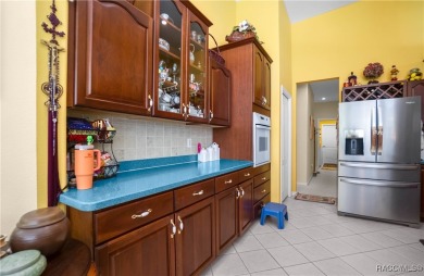 Check out this lavish 4- bedroom, 2.5-bath, 3-car garage home at on Twisted Oaks Golf Club in Florida - for sale on GolfHomes.com, golf home, golf lot
