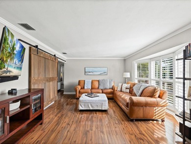 Tucked into one of Dunedin's most sought after on The Dunedin Country Club in Florida - for sale on GolfHomes.com, golf home, golf lot