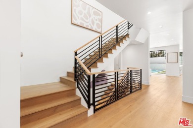 Prepare to be enchanted by one of the most beautiful homes ever on Rancho Park Golf Course in California - for sale on GolfHomes.com, golf home, golf lot