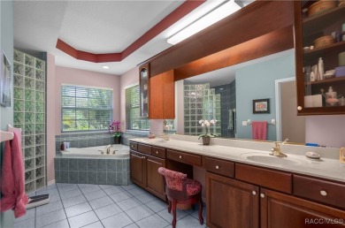 Check out this lavish 4- bedroom, 2.5-bath, 3-car garage home at on Twisted Oaks Golf Club in Florida - for sale on GolfHomes.com, golf home, golf lot