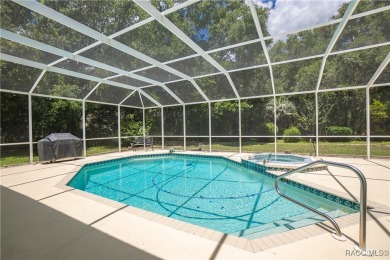 Check out this lavish 4- bedroom, 2.5-bath, 3-car garage home at on Twisted Oaks Golf Club in Florida - for sale on GolfHomes.com, golf home, golf lot