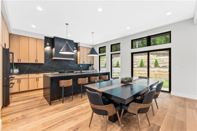 This exquisite custom home on a quiet cul-de-sac in The National on The Deuce At the National Golf Club of Kansas City in Missouri - for sale on GolfHomes.com, golf home, golf lot