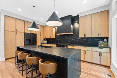 This exquisite custom home on a quiet cul-de-sac in The National on The Deuce At the National Golf Club of Kansas City in Missouri - for sale on GolfHomes.com, golf home, golf lot