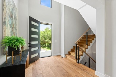 This exquisite custom home on a quiet cul-de-sac in The National on The Deuce At the National Golf Club of Kansas City in Missouri - for sale on GolfHomes.com, golf home, golf lot