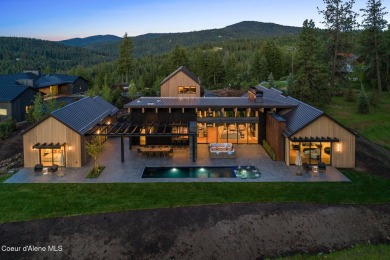 Welcome to a meticulously crafted masterpiece overlooking the on Gozzer Ranch Golf and Lake Club in Idaho - for sale on GolfHomes.com, golf home, golf lot