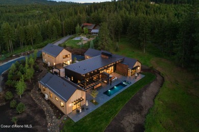 Welcome to a meticulously crafted masterpiece overlooking the on Gozzer Ranch Golf and Lake Club in Idaho - for sale on GolfHomes.com, golf home, golf lot