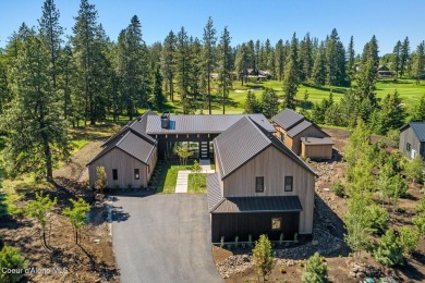 Welcome to a meticulously crafted masterpiece overlooking the on Gozzer Ranch Golf and Lake Club in Idaho - for sale on GolfHomes.com, golf home, golf lot