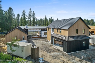 Welcome to a meticulously crafted masterpiece overlooking the on Gozzer Ranch Golf and Lake Club in Idaho - for sale on GolfHomes.com, golf home, golf lot
