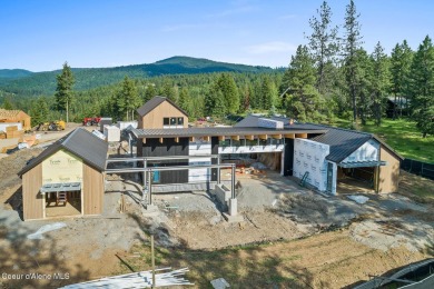 Welcome to a meticulously crafted masterpiece overlooking the on Gozzer Ranch Golf and Lake Club in Idaho - for sale on GolfHomes.com, golf home, golf lot