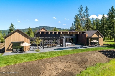 Welcome to a meticulously crafted masterpiece overlooking the on Gozzer Ranch Golf and Lake Club in Idaho - for sale on GolfHomes.com, golf home, golf lot
