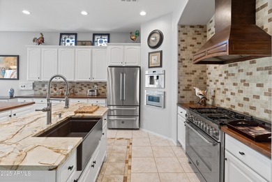 In the sought after golf and gate guarded community of Arizona on Arizona Traditions Golf Club in Arizona - for sale on GolfHomes.com, golf home, golf lot