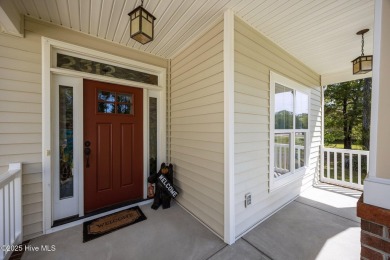 Welcome to 2312 Caracara Drive -- Where Comfort Meets Coastal on Harbour Point Golf Club in North Carolina - for sale on GolfHomes.com, golf home, golf lot