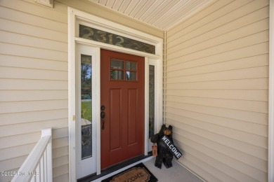 Welcome to 2312 Caracara Drive -- Where Comfort Meets Coastal on Harbour Point Golf Club in North Carolina - for sale on GolfHomes.com, golf home, golf lot