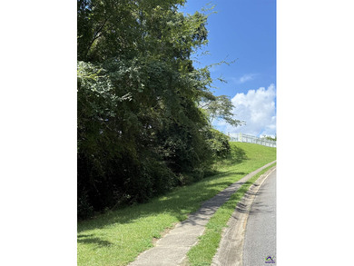 A beauty of a lot in a gated community--complete with a gorgeous on Oakview Golf and Country Club in Georgia - for sale on GolfHomes.com, golf home, golf lot