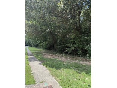 A beauty of a lot in a gated community--complete with a gorgeous on Oakview Golf and Country Club in Georgia - for sale on GolfHomes.com, golf home, golf lot