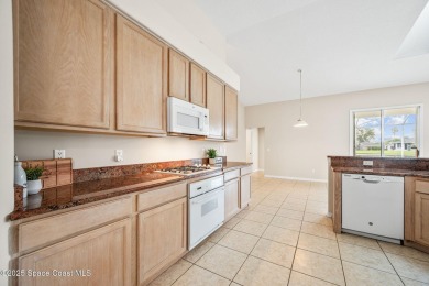 Experience panoramic WATER VIEWS in the highly sought-after on Suntree Country Club in Florida - for sale on GolfHomes.com, golf home, golf lot
