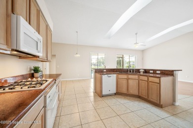 Experience panoramic WATER VIEWS in the highly sought-after on Suntree Country Club in Florida - for sale on GolfHomes.com, golf home, golf lot