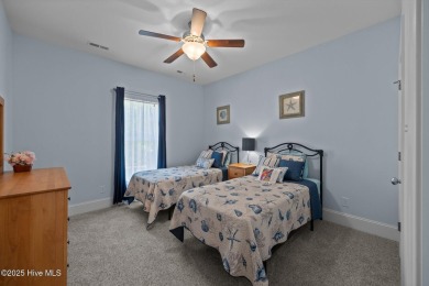 Welcome to 2312 Caracara Drive -- Where Comfort Meets Coastal on Harbour Point Golf Club in North Carolina - for sale on GolfHomes.com, golf home, golf lot
