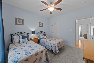 Welcome to 2312 Caracara Drive -- Where Comfort Meets Coastal on Harbour Point Golf Club in North Carolina - for sale on GolfHomes.com, golf home, golf lot