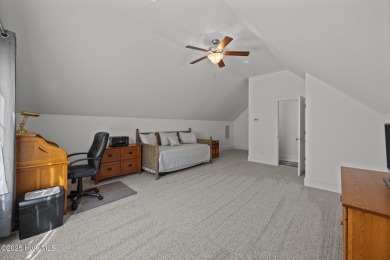 Welcome to 2312 Caracara Drive -- Where Comfort Meets Coastal on Harbour Point Golf Club in North Carolina - for sale on GolfHomes.com, golf home, golf lot
