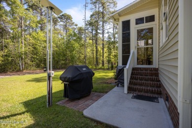 Welcome to 2312 Caracara Drive -- Where Comfort Meets Coastal on Harbour Point Golf Club in North Carolina - for sale on GolfHomes.com, golf home, golf lot