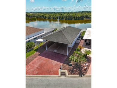 This beautiful port measures 25'x50'x13' to accommodate the on The Great Outdoors Golf and Country Club in Florida - for sale on GolfHomes.com, golf home, golf lot