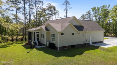 Welcome to 2312 Caracara Drive -- Where Comfort Meets Coastal on Harbour Point Golf Club in North Carolina - for sale on GolfHomes.com, golf home, golf lot