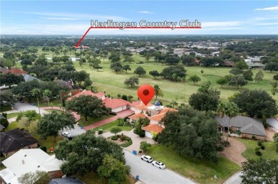 Remarkable residence spanning 5,945 square feet of living space on Harlingen Country Club in Texas - for sale on GolfHomes.com, golf home, golf lot