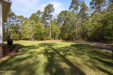 Welcome to 2312 Caracara Drive -- Where Comfort Meets Coastal on Harbour Point Golf Club in North Carolina - for sale on GolfHomes.com, golf home, golf lot