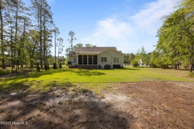 Welcome to 2312 Caracara Drive -- Where Comfort Meets Coastal on Harbour Point Golf Club in North Carolina - for sale on GolfHomes.com, golf home, golf lot