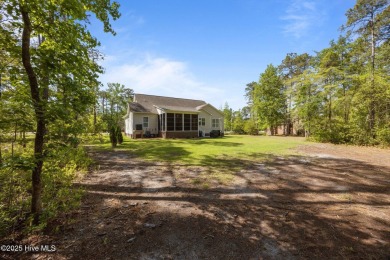Welcome to 2312 Caracara Drive -- Where Comfort Meets Coastal on Harbour Point Golf Club in North Carolina - for sale on GolfHomes.com, golf home, golf lot