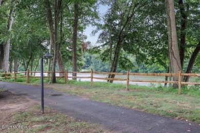 Lakeside location! Renovated and pristine lower-level villa with on Shadow Lake Village in New Jersey - for sale on GolfHomes.com, golf home, golf lot
