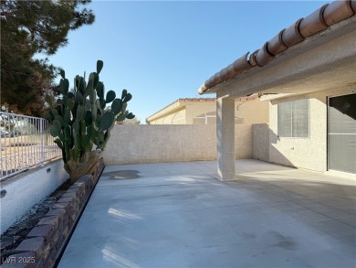 This stunning single-story residence boasts a 3-car garage, 3 on Stallion Mountain Golf Course in Nevada - for sale on GolfHomes.com, golf home, golf lot