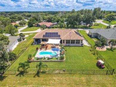 Welcome to this exceptional custom-built Alexander home on Oak Hills Country Club in Florida - for sale on GolfHomes.com, golf home, golf lot