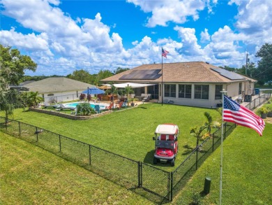 Welcome to this exceptional custom-built Alexander home on Oak Hills Country Club in Florida - for sale on GolfHomes.com, golf home, golf lot