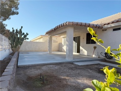 This stunning single-story residence boasts a 3-car garage, 3 on Stallion Mountain Golf Course in Nevada - for sale on GolfHomes.com, golf home, golf lot