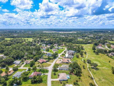 Welcome to this exceptional custom-built Alexander home on Oak Hills Country Club in Florida - for sale on GolfHomes.com, golf home, golf lot