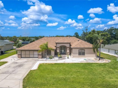 Welcome to this exceptional custom-built Alexander home on Oak Hills Country Club in Florida - for sale on GolfHomes.com, golf home, golf lot