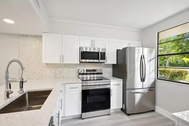 Gorgeous updated large 2 BR/ 2Ba first floor  unit with on Bear Lakes Country Club in Florida - for sale on GolfHomes.com, golf home, golf lot