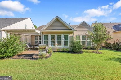 Discover the perfect blend of comfort, style, and active living on Canongate Golf At Sun City Peachtree in Georgia - for sale on GolfHomes.com, golf home, golf lot