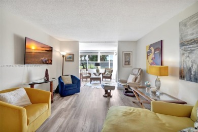 Stunning 1-bedroom, 1.5-bathroom ground-floor unit with a on Sunrise Lakes Phase III in Florida - for sale on GolfHomes.com, golf home, golf lot