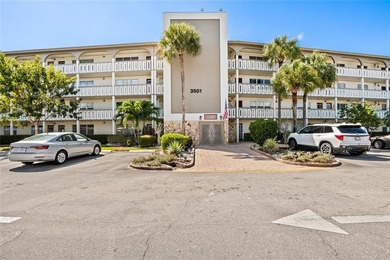 Spacious 2-bedroom, 2-bathroom top-floor condo overlooking a on  in Florida - for sale on GolfHomes.com, golf home, golf lot