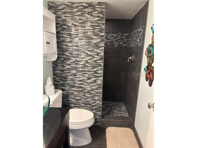 Beautiful 4-bedroom, 3-bathroom townhome in the highly desirable on Baypoint Golf Club in Florida - for sale on GolfHomes.com, golf home, golf lot